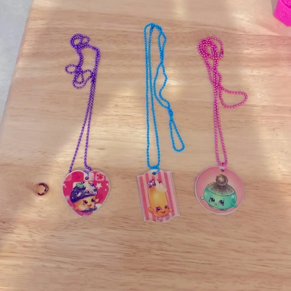 Three Shopkins Charm Necklaces/Dog Tags